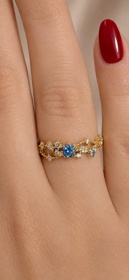 Adjustable Gold Filigree Ring with Blue Crystal Accent