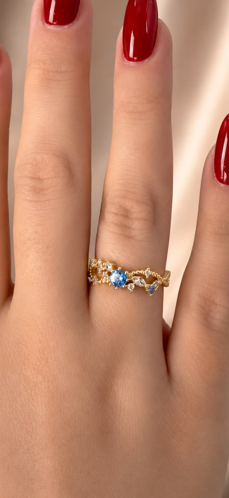 Adjustable Gold Filigree Ring with Blue Crystal Accent
