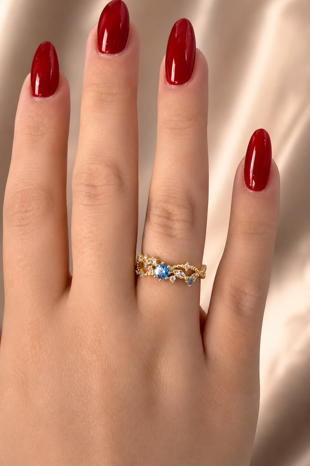 Adjustable Gold Filigree Ring with Blue Crystal Accent