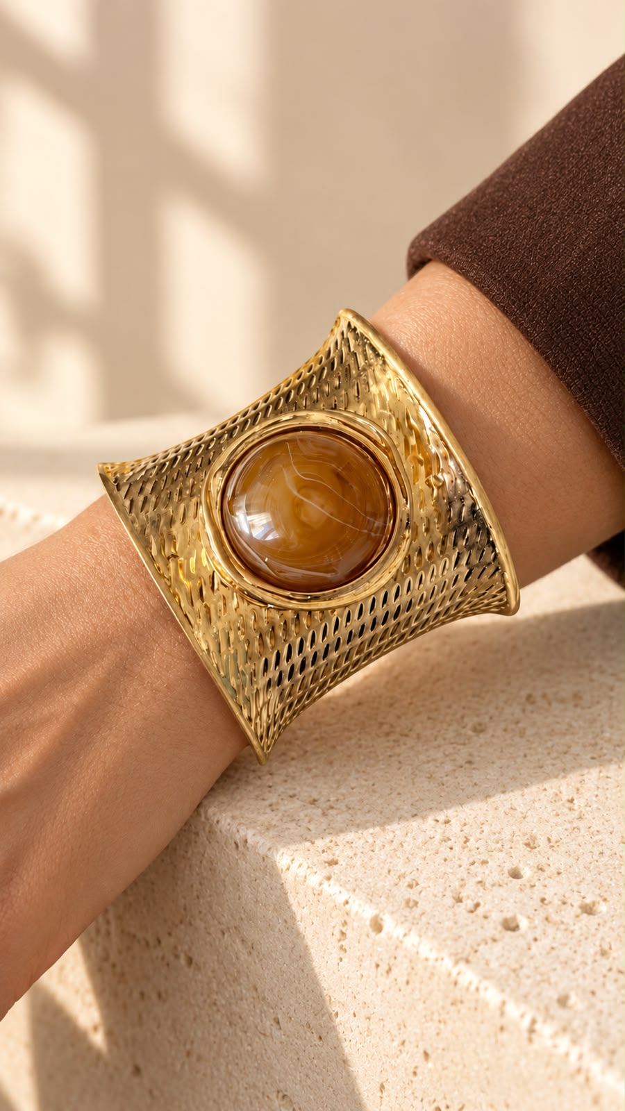 Gold-Tone Wide Cuff Bracelet with Amber-Colored Center