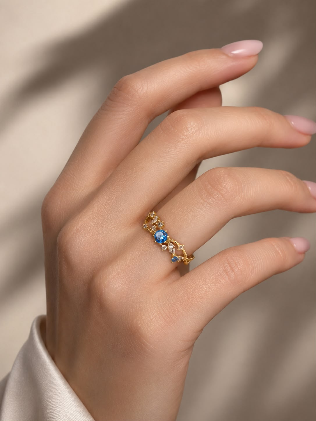 Adjustable Gold Filigree Ring with Blue Crystal Accent