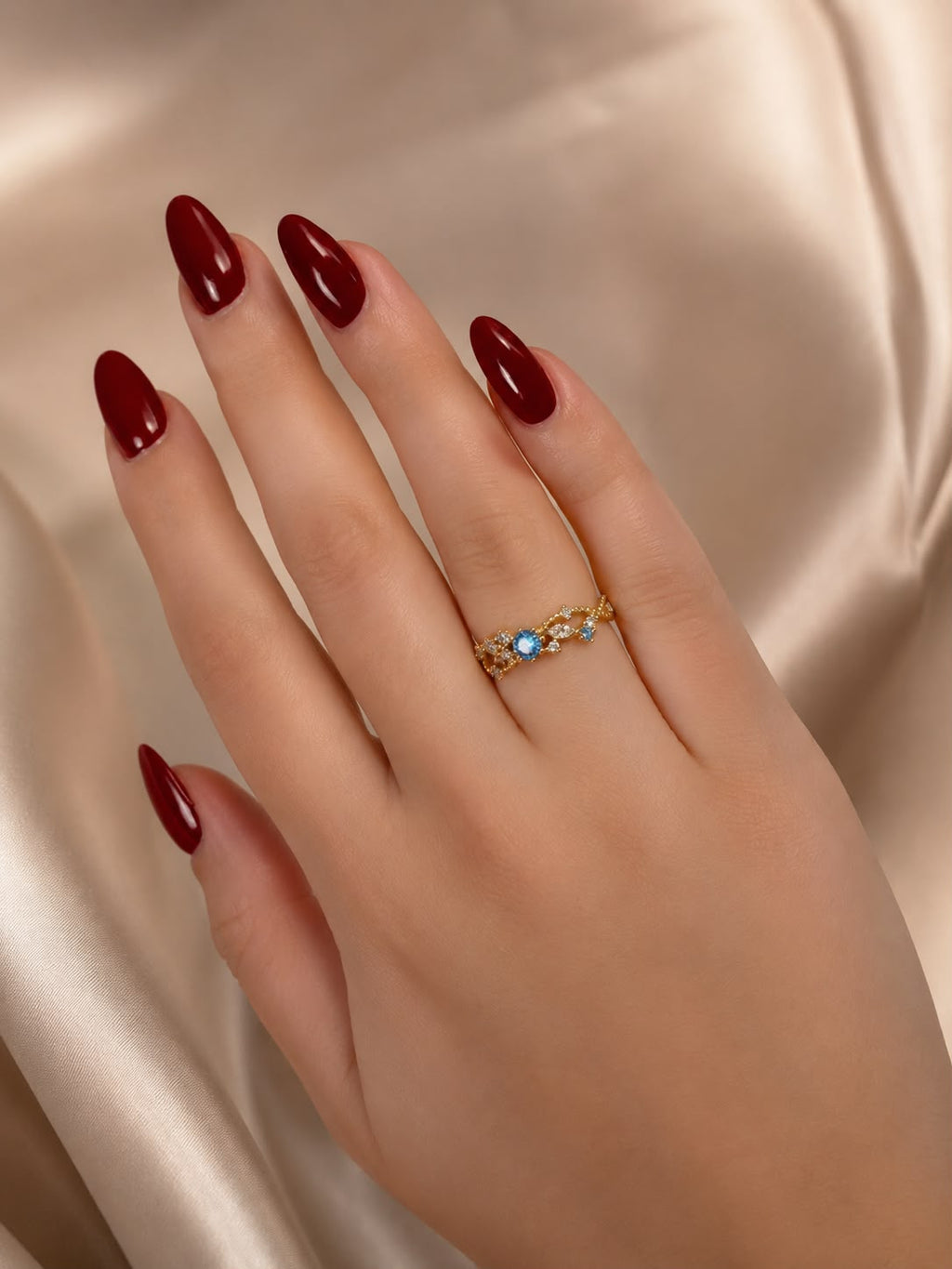 Adjustable Gold Filigree Ring with Blue Crystal Accent